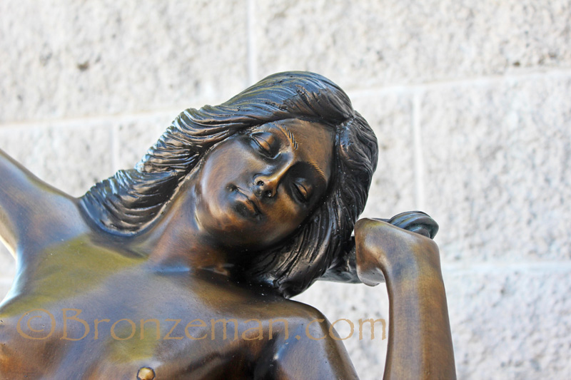bronze woman statue