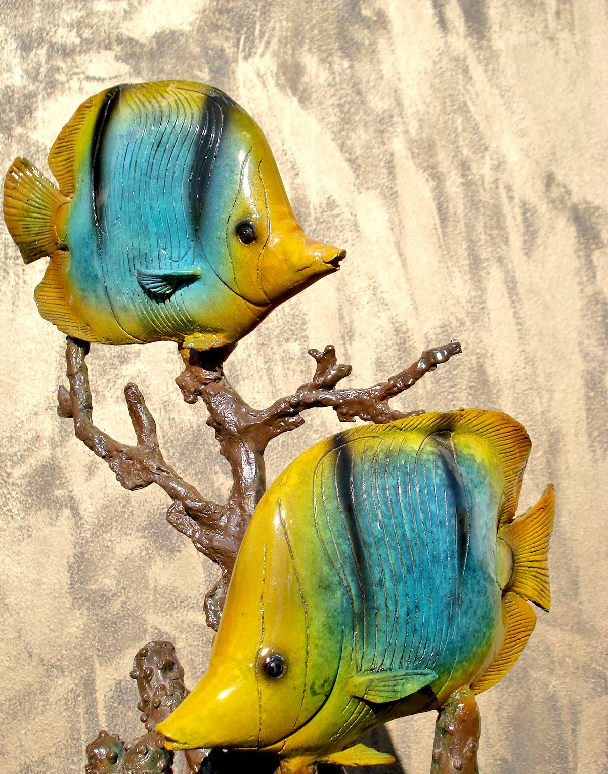 bronze statue of butterfly fish