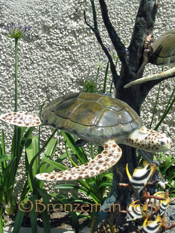 bronze statue of sea turtles