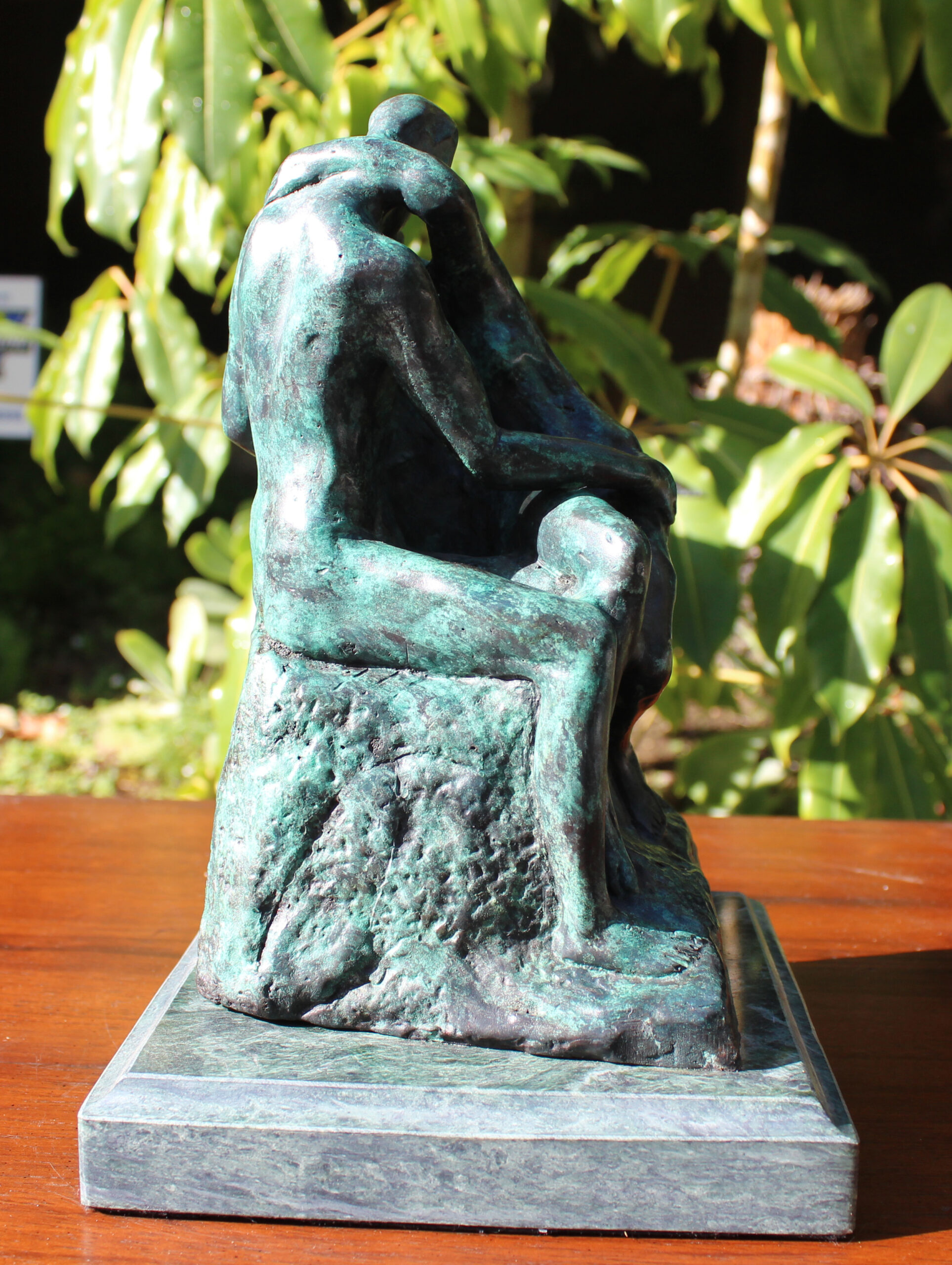 bronze rodin statue of the kiss
