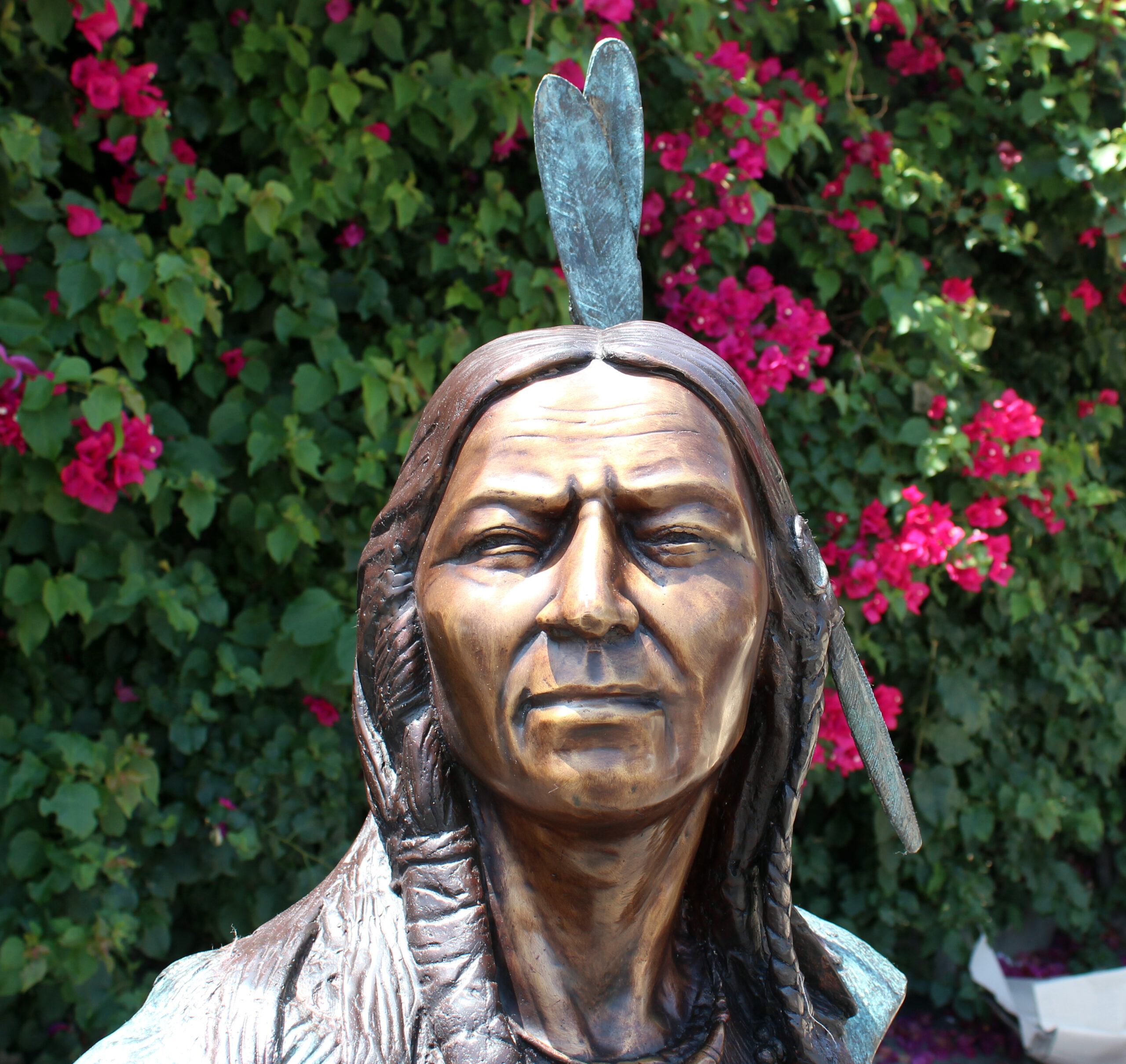 bronze statue of a native american bust