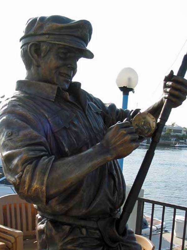 custom bronze statue of a fisherman