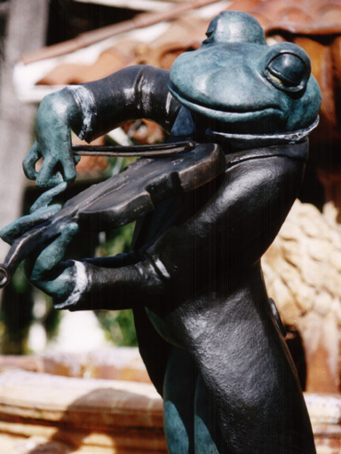 bronze frog playing violin