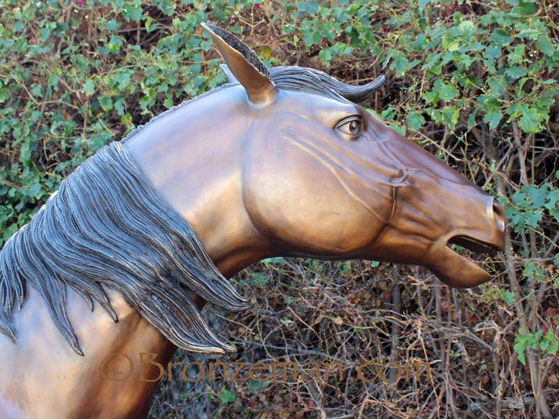 bronze horse and pony