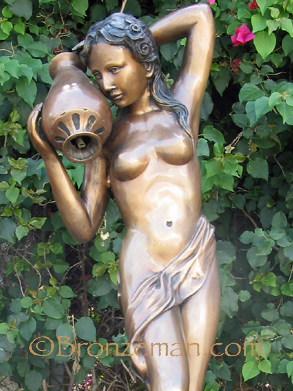 bronze fountain statue of a woman