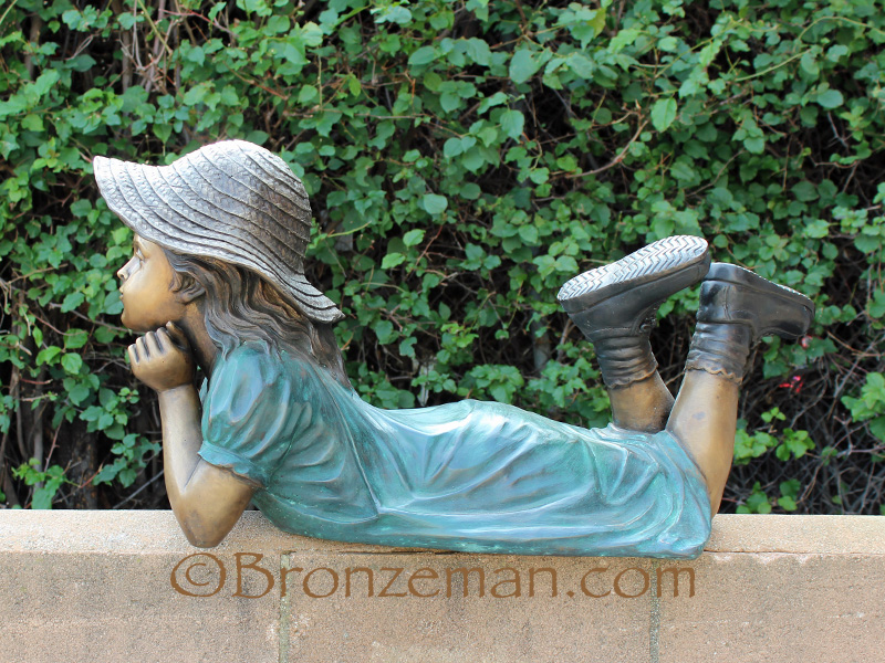 bronze statue of a girl