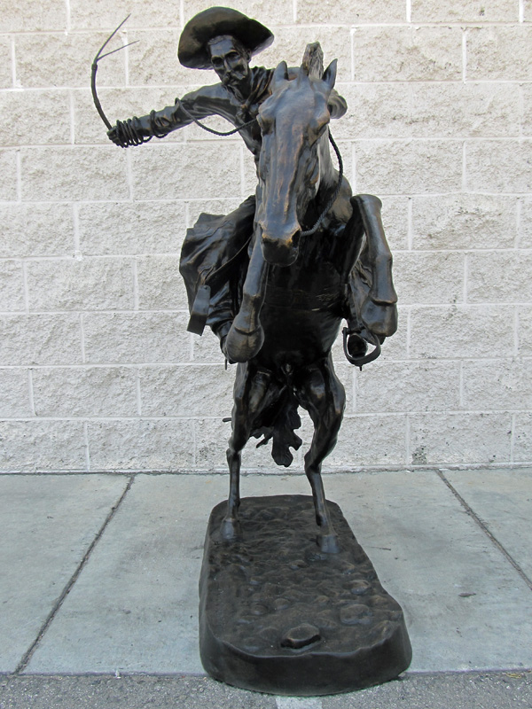 bronze bronco buster statue