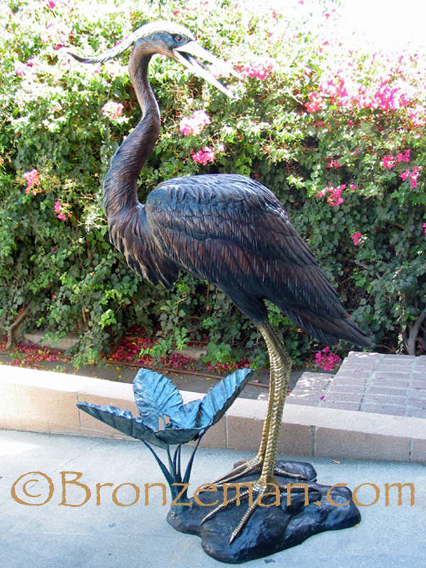 bronze heron statue