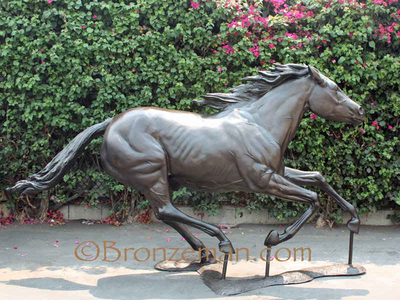 bronze horse running