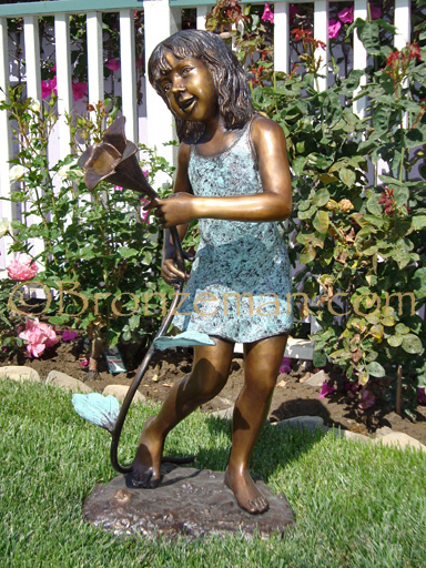 bronze statue of a girl with flower