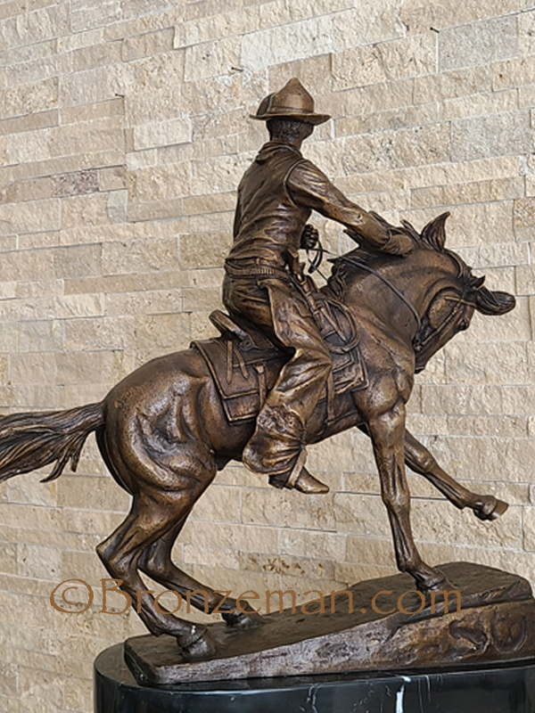 bronze Remington statue the cowboy