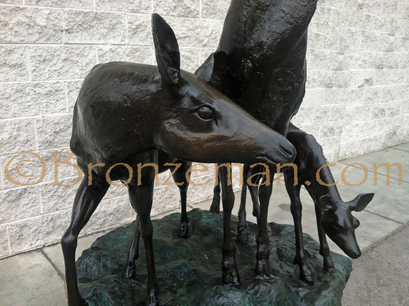 bronze deer family statue