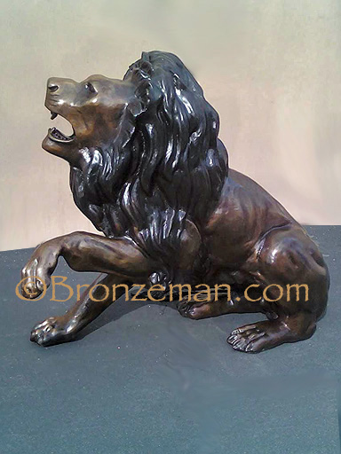 bronze sitting lion statue