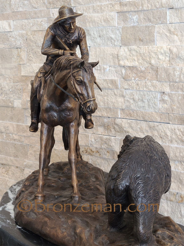 bronze cowboy statue double trouble