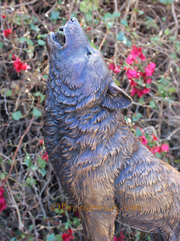 bronze statue of a wolf howling