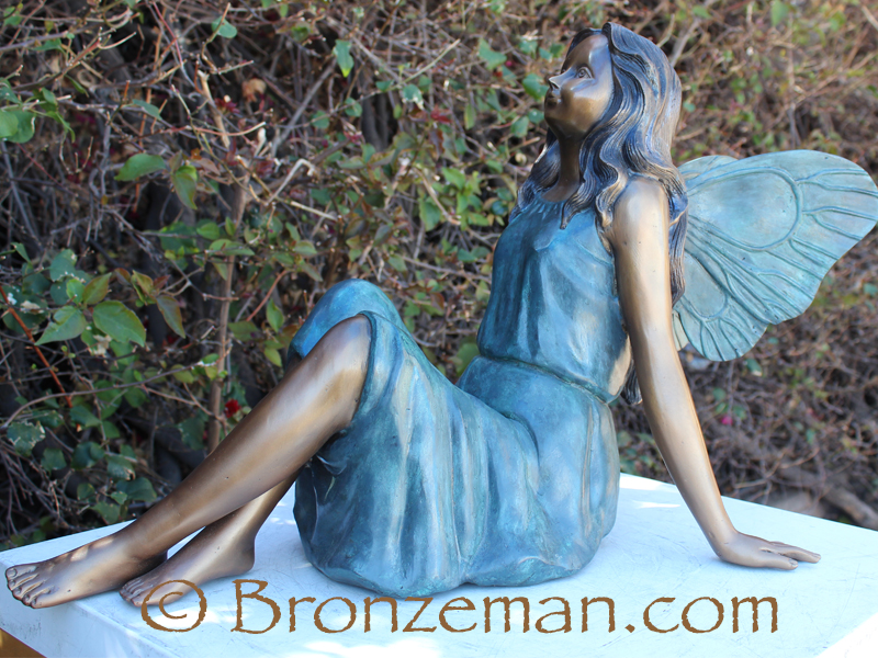 bronze fairy sitting
