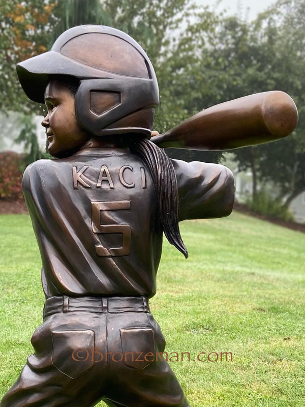 custom bronze statue girl playing softball