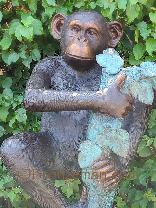 bronze statue of chimps in a tree