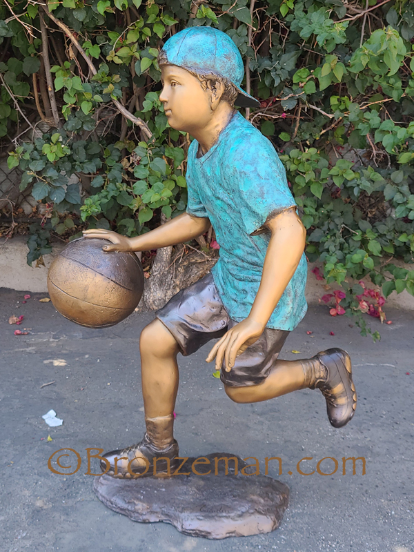 bronze basketball player statue