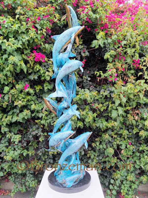 Bronze dolphin statue