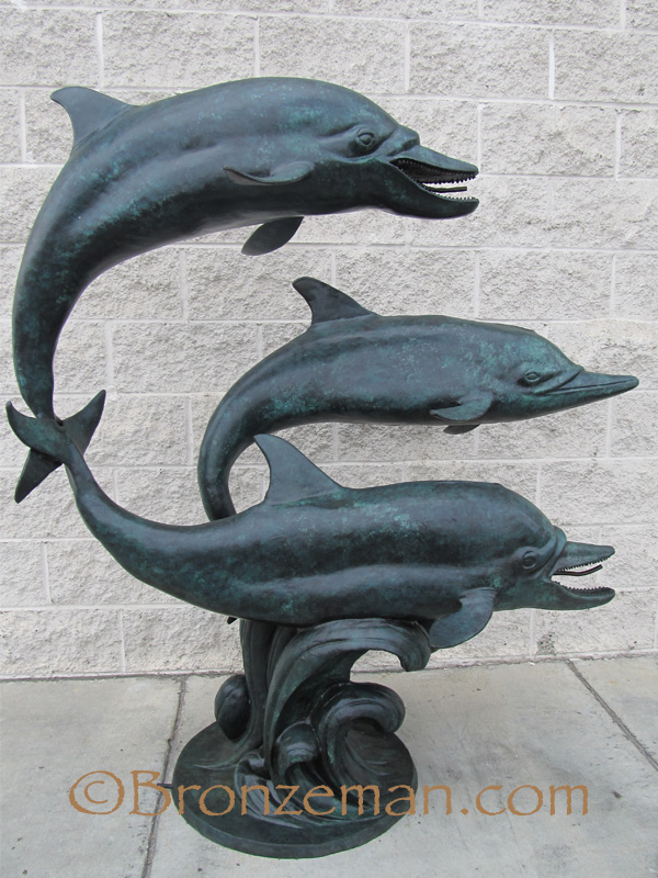 bronze dolphins statue
