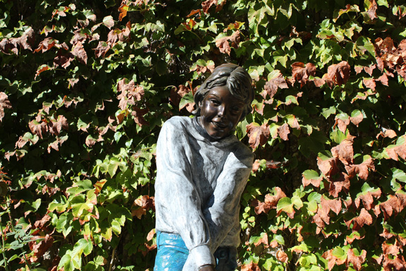 bronze statue of children playing