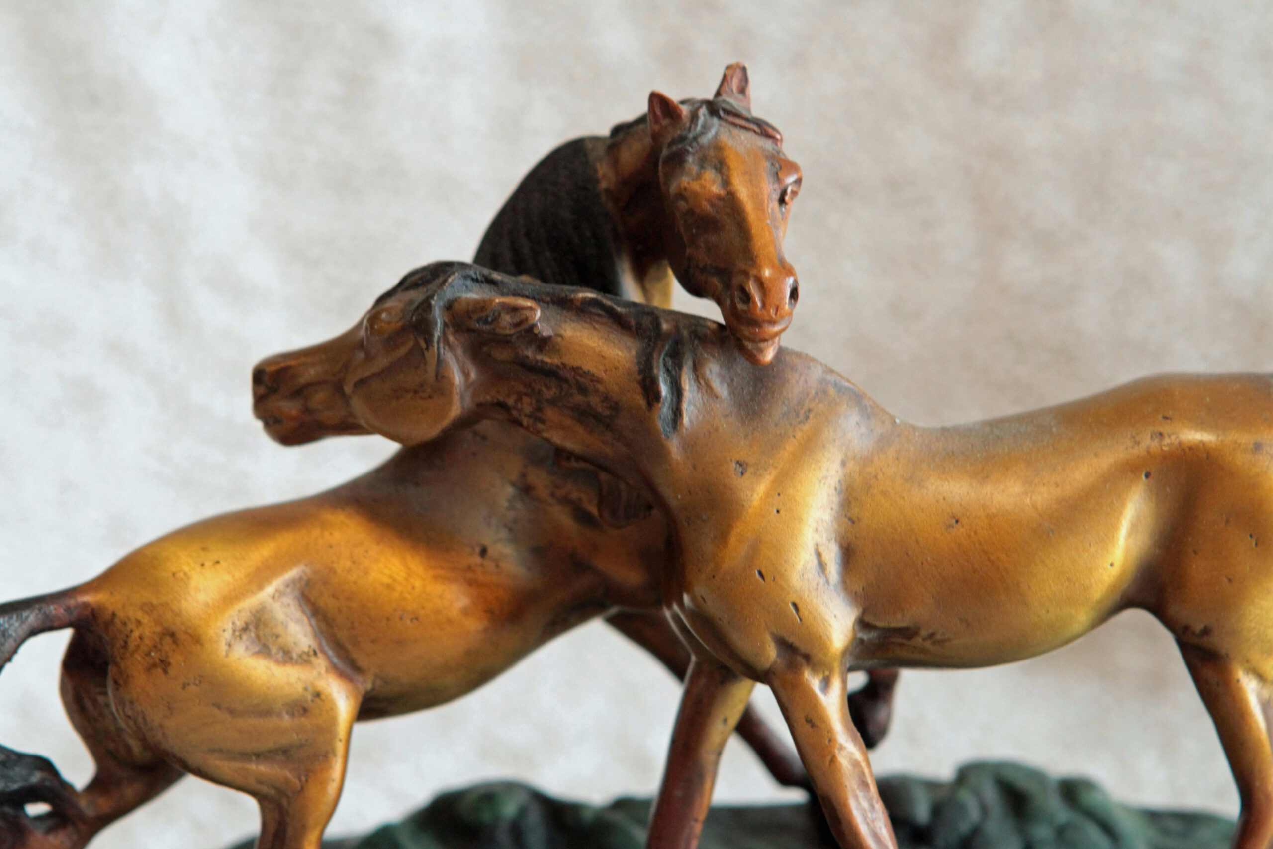 bronze statue of two horses