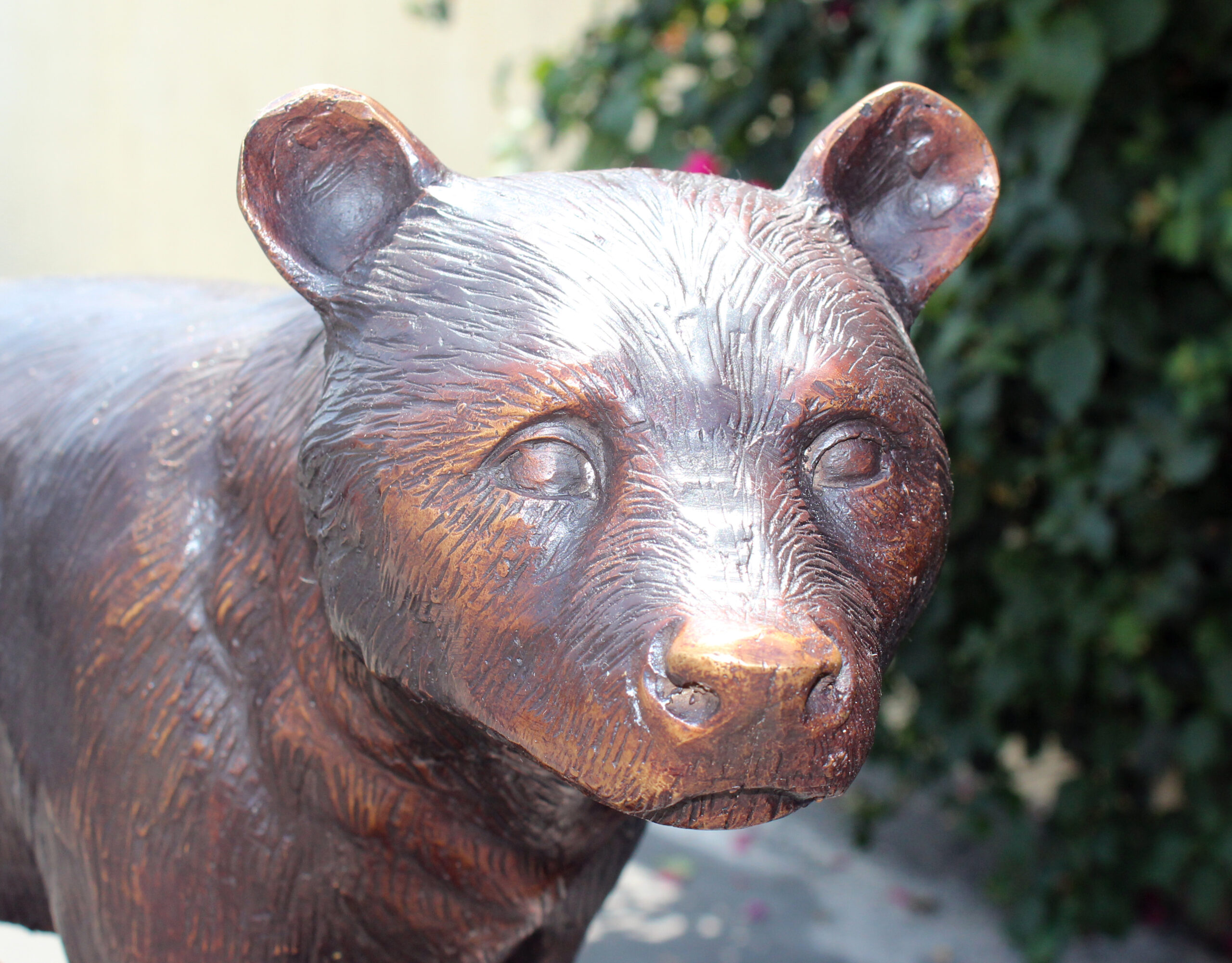 bronze bear hunting statue