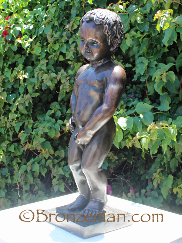 bronze statue of a boy peeing