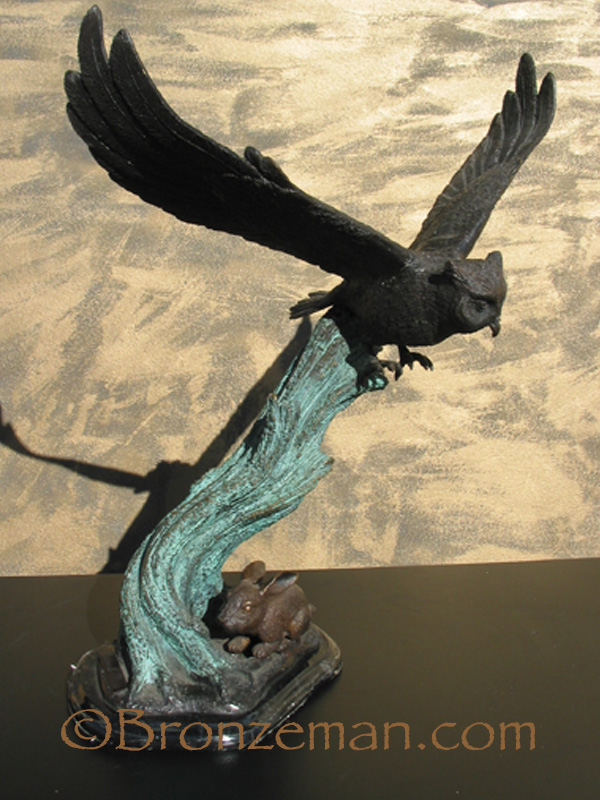 bronze statue of owl