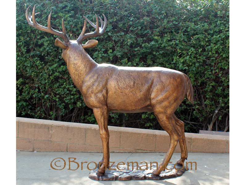 Bronze statue of buck and doe