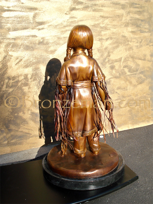 bronze statue of a native american girl