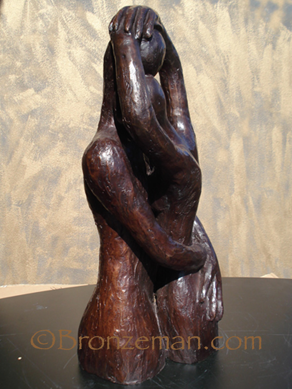 bronze statue of lovers