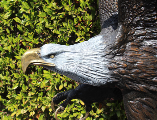 bronze eagle on globe