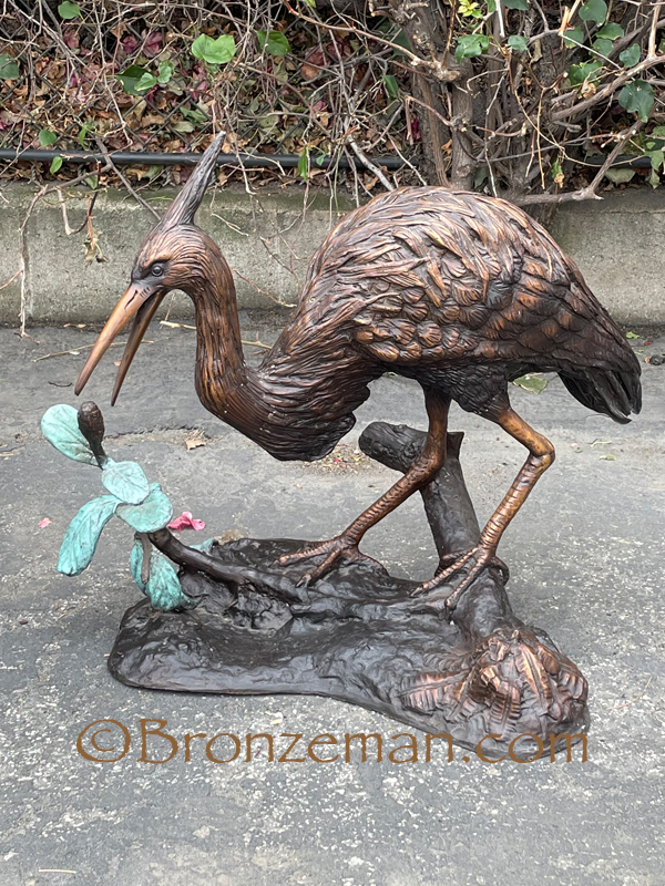 bronze herons statues