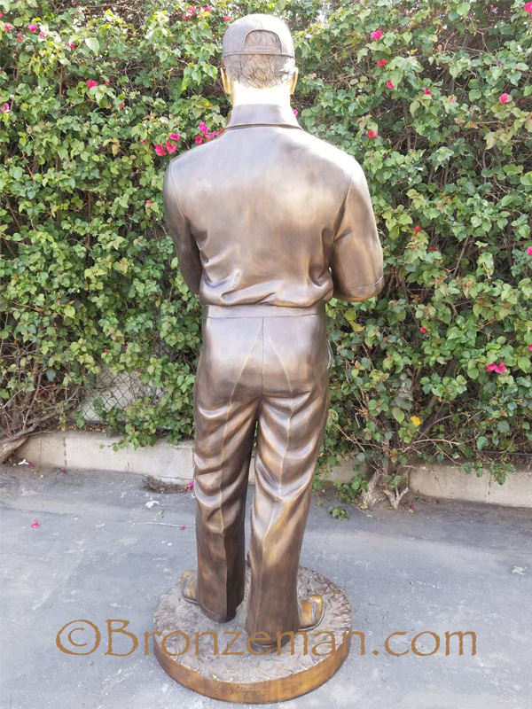 bronze golfer statue