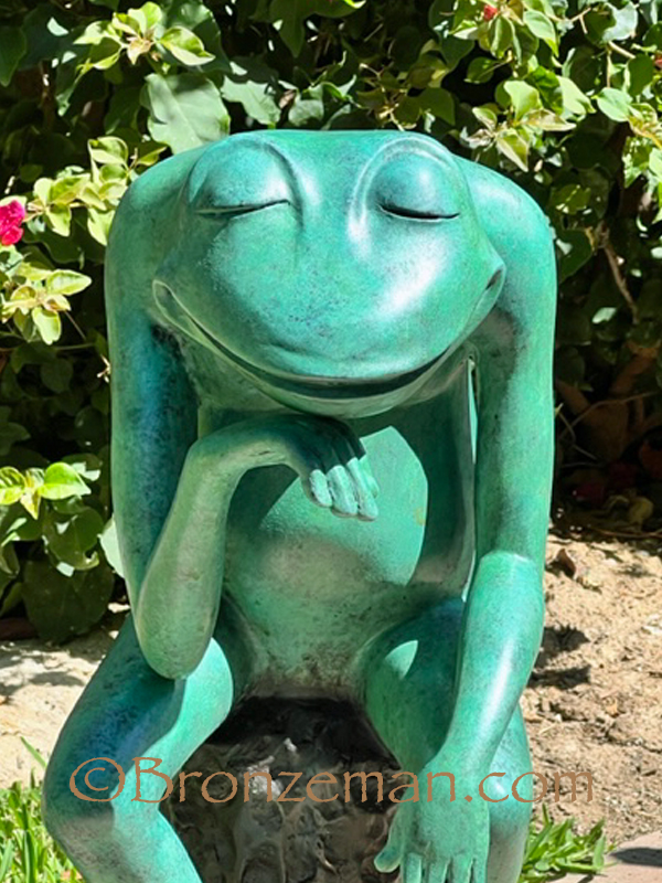 bronze frog thinker statue