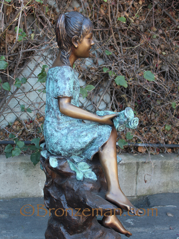 bronze statue of a girl