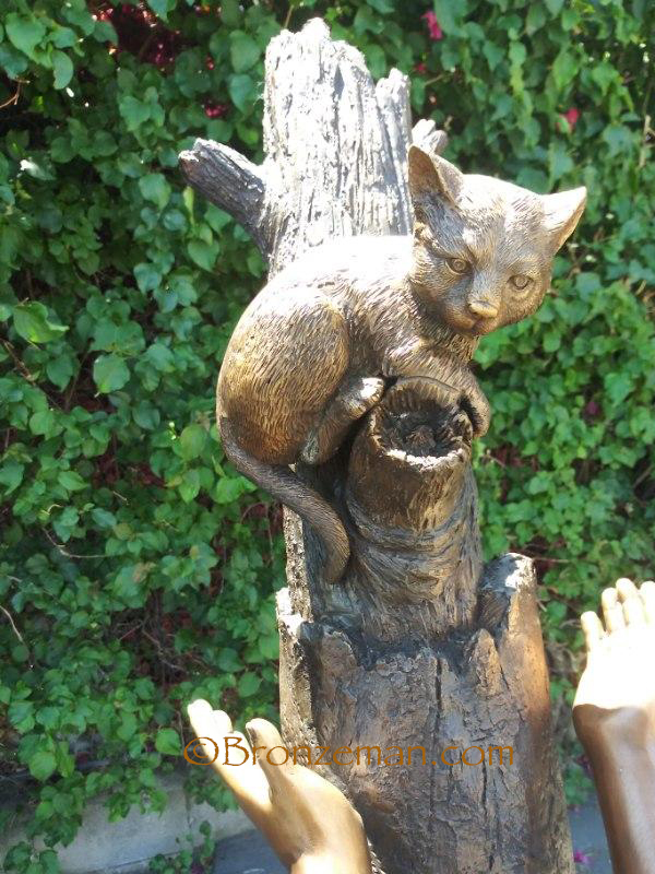 bronze children statue