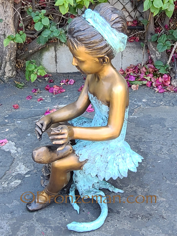 bronze girl statue