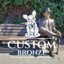 bronze custom statue of man on bench