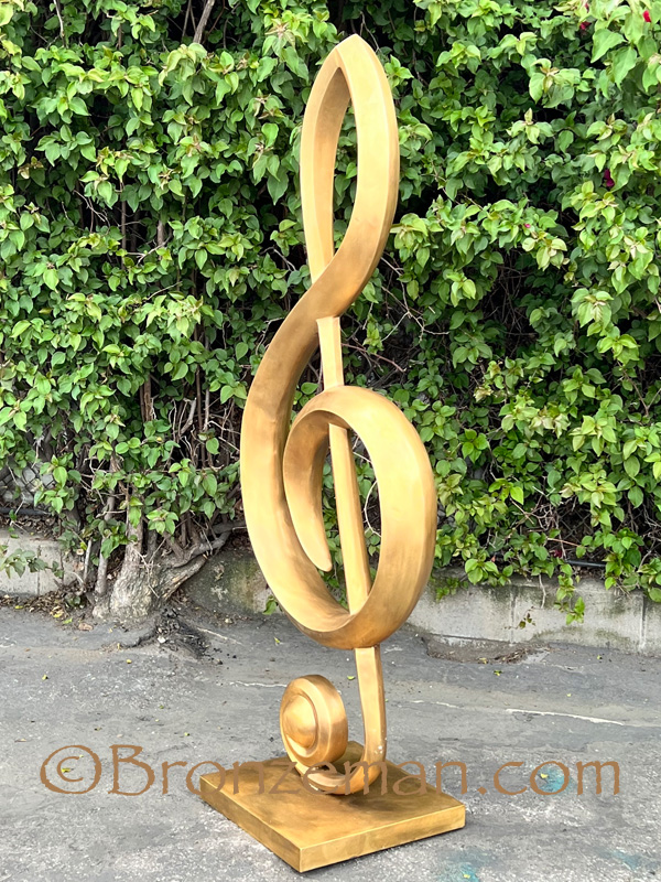 bronze statue of a treble clef